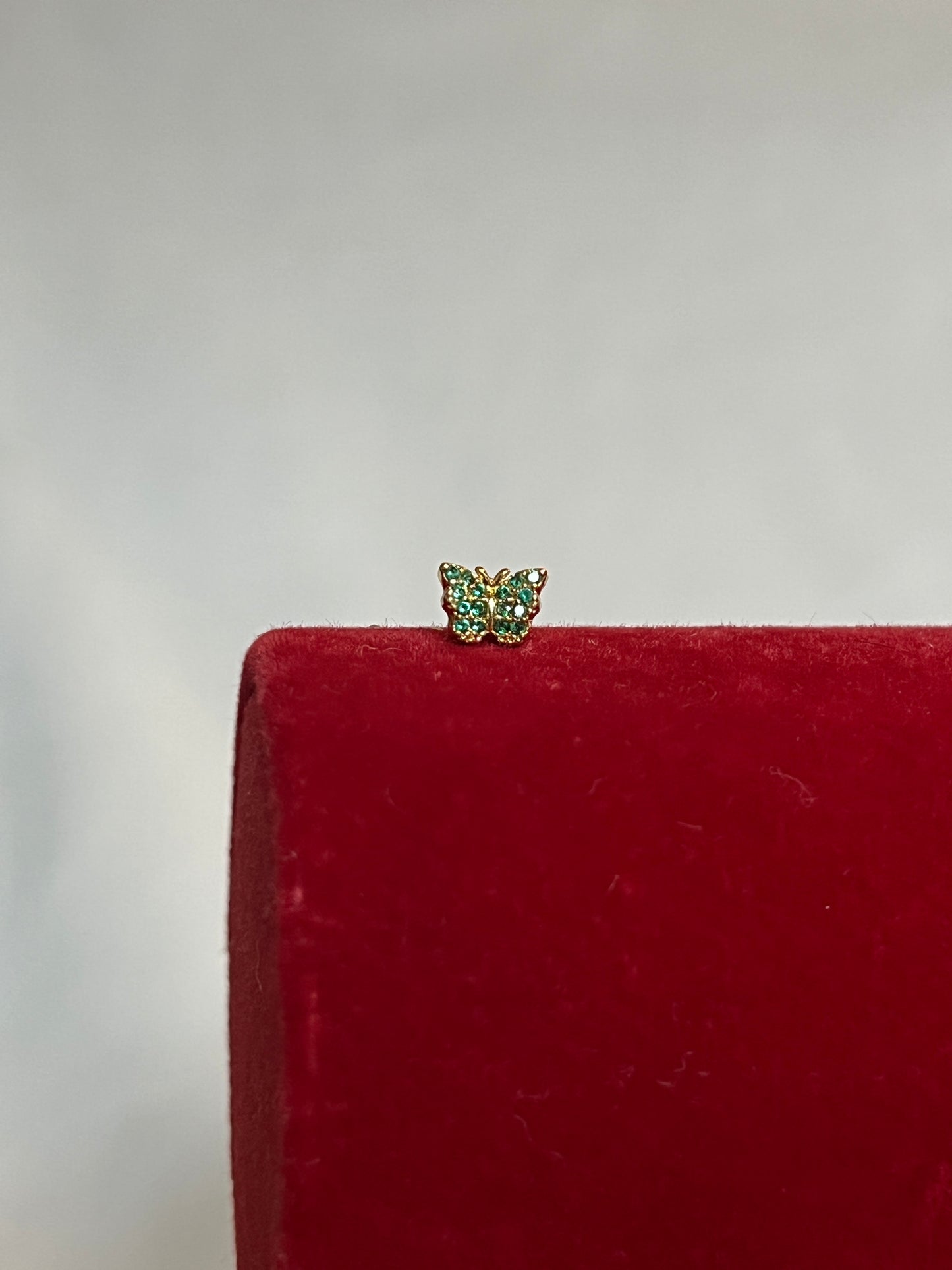 Green Butterfly Piercing